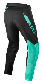 Calças Alpinestars Supertech Blaze, calças de motocross, pretas e verde pastel, vista traseira de três quartos com a marca ASTARS na coxa, malha respirável na parte inferior das pernas e tecido elástico para desempenho ergonómico