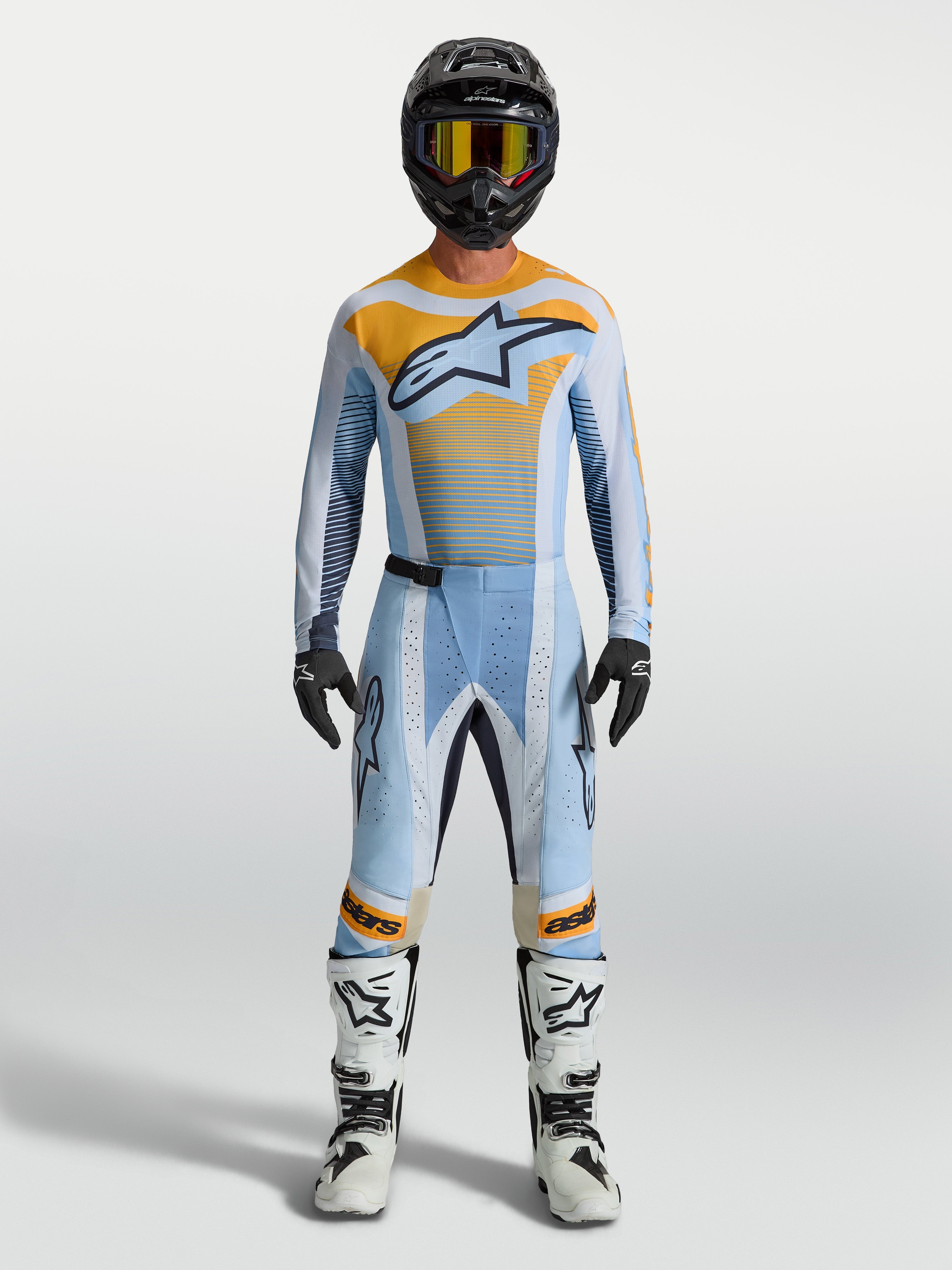 Alpinestars Calças Techstar Maven, calças de motocross para homem, azul e laranja, com corte de corrida e zonas elásticas.