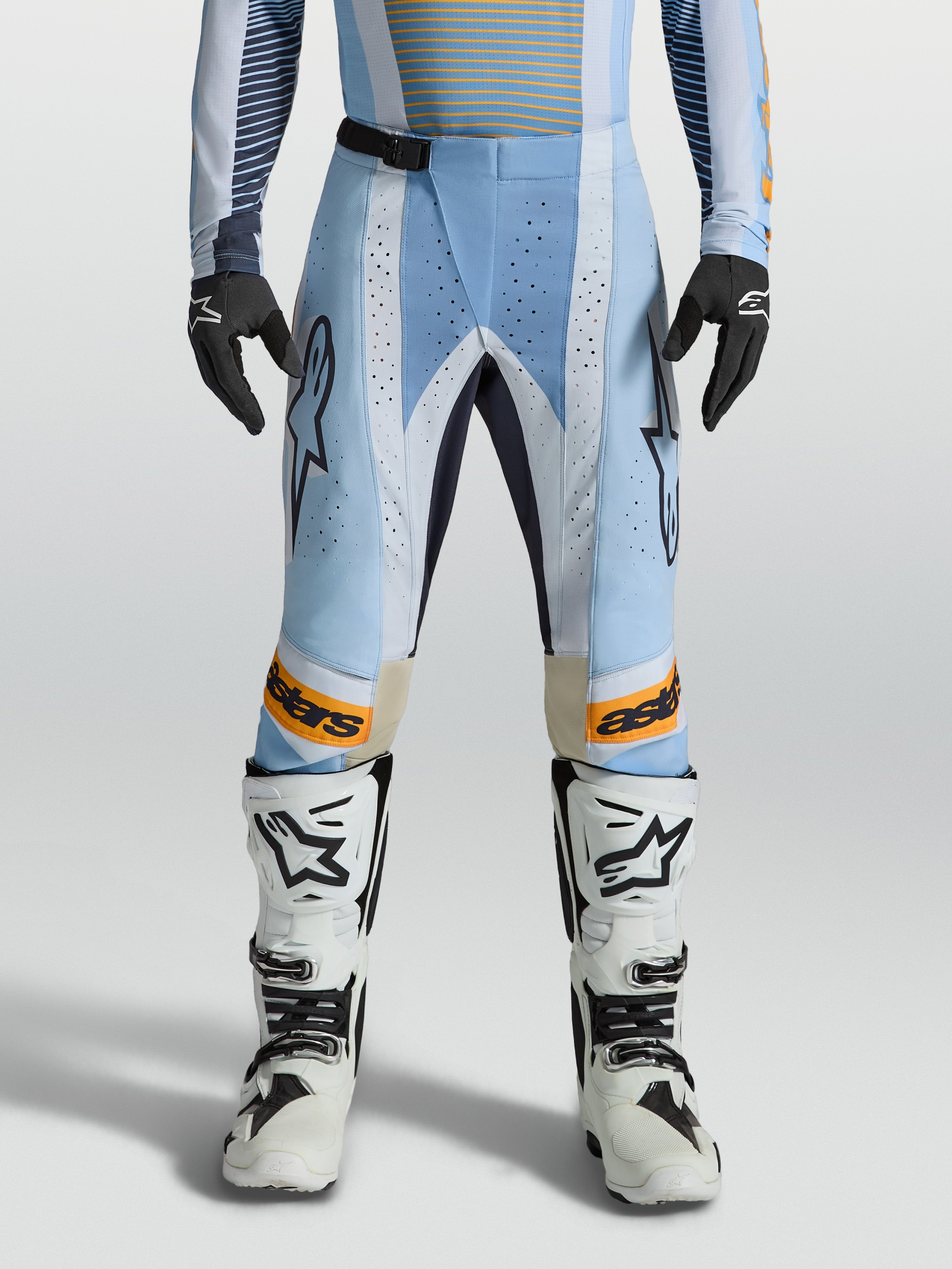 Alpinestars Calças Techstar Maven, calças de motocross para homem, azul e laranja, com ventilação a laser e corte ergonómico.