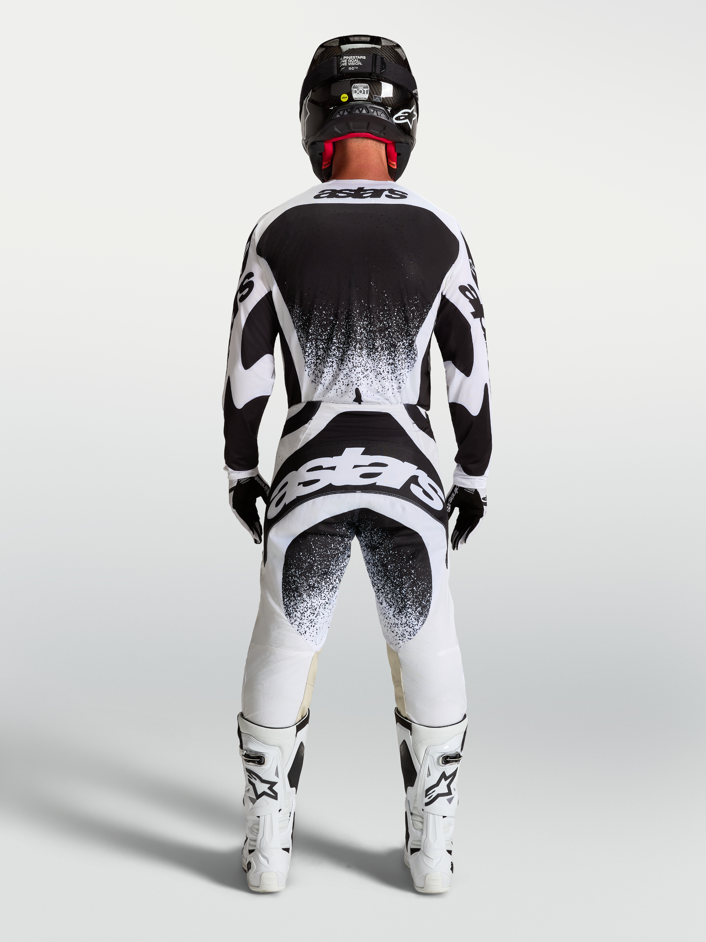 Alpinestars Techstar Swan, conjunto de camisola e calças de motocross para homem, preto e branco, ajuste atlético de corrida com logótipo Astars nas costas, vista traseira