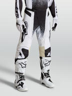 Alpinestars Calças Techstar Swan, calças de motocross brancas e pretas, ajuste de corrida multitecido com botas a condizer