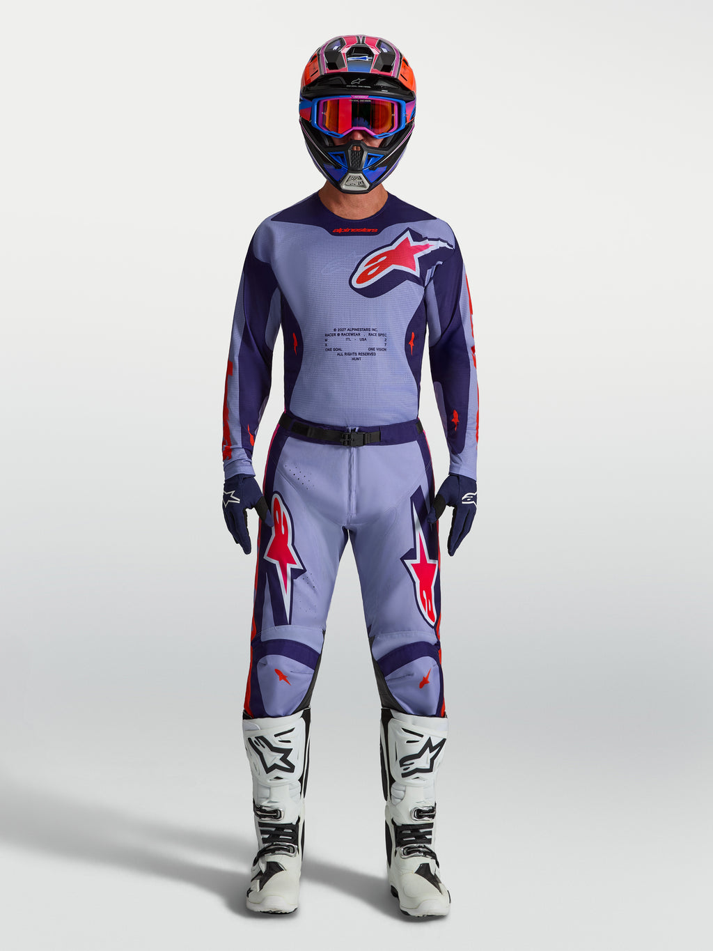 Calças Racer Air Hunt da Alpinestars, calças de motocross para homem, roxas claras e rosa fluo, com malha ventilada para fluxo de ar e design ergonómico para off-road.