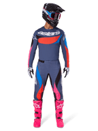 Alpinestars 2025 Techstar Dreem Pants, Motocross Pants, Gray Multicolor with pink and blue accents, worn by a rider with a matching technical jersey, black helmet, and bright pink boots, complete high-performance off-road racing gear.