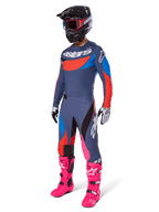 Alpinestars 2025 Techstar Dreem Pants, Motocross Pants, Gray Multicolor with blue red and pink accents, worn with matching jersey and bright pink boots, featuring black helmet and white gloves, complete gear set for off-road racing