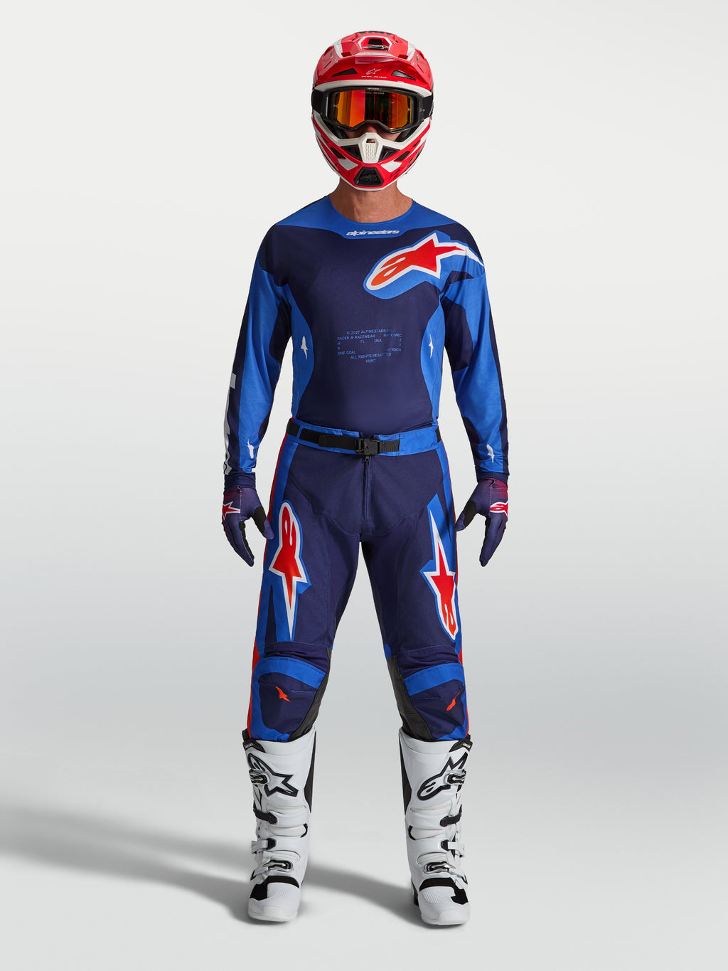 Alpinestars Racer Hunt, calças de motocross para homem, azuis e vermelhas, modelo com equipamento completo, construção durável e design ergonómico para pilotagem off-road.