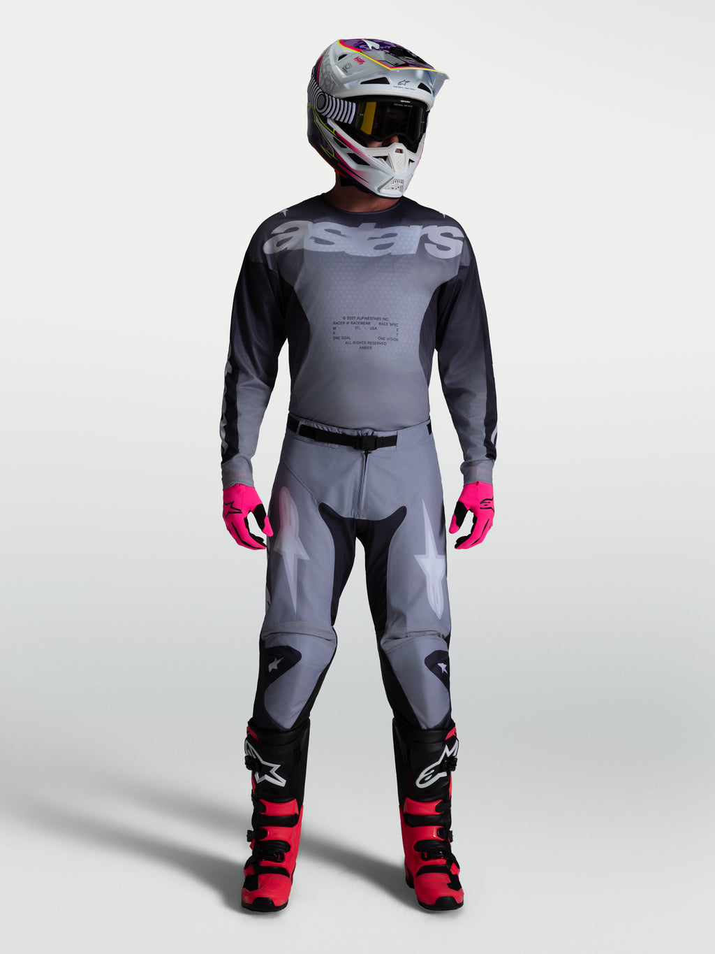 Alpinestars Calças Racer Amber, calças de motocross para homem, cinzentas com detalhes em lilás e ajuste de corrida pré-curvado.