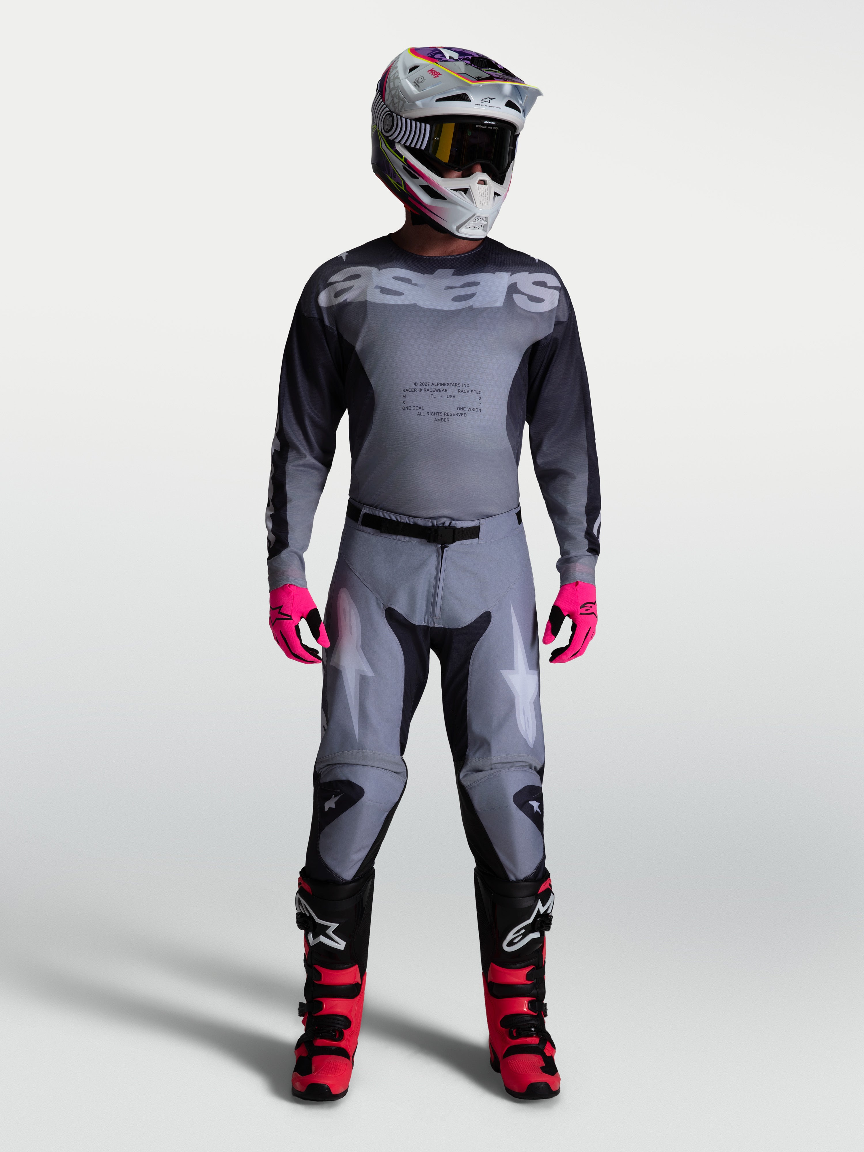 Alpinestars Calças Racer Amber, calças de motocross para homem, cinzentas com detalhes em lilás e ajuste de corrida pré-curvado.
