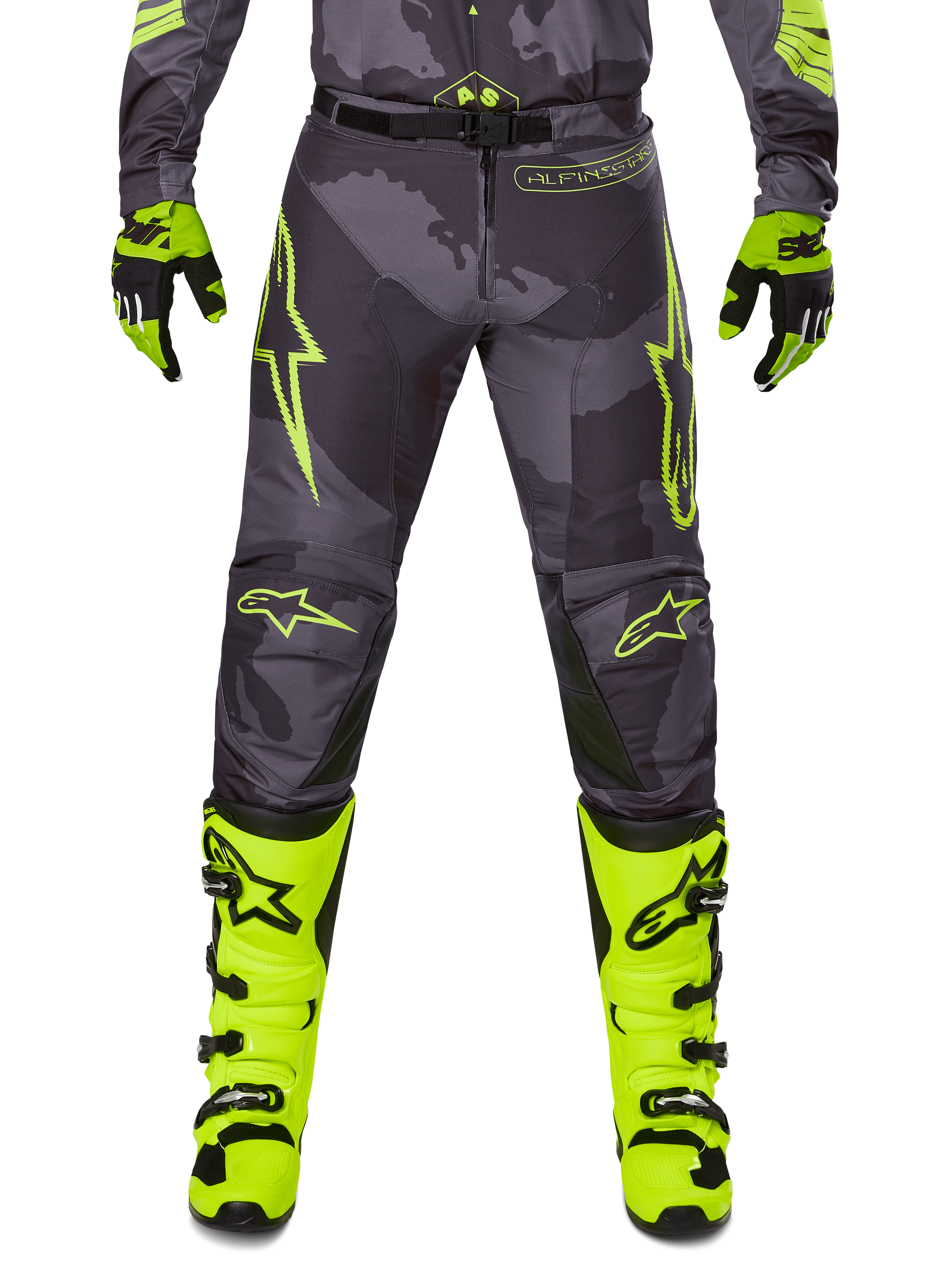 Alpinestars Racer Hollow Pants 2025, calças de motocross cinzentas com detalhes amarelo néon, estrelas amarelas e logótipos, luvas pretas e amarelas, botas amarelo néon com fivelas pretas, equipamento de proteção desportivo