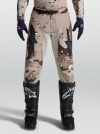 Alpinestars Racer Lone, calças de motocross para homem, camuflagem deserto e pretas, com reforços em pele e painéis elásticos.