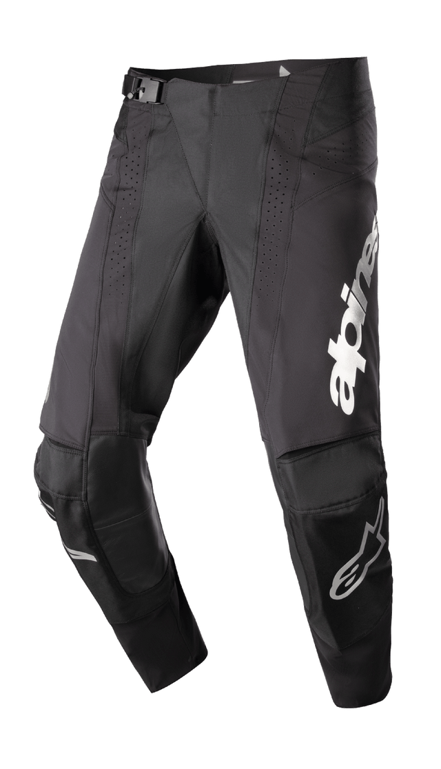 Alpinestars 2023 Techstar Arch Pants, Black and Silver Motocross Pants, featuring perforated ventilation panels and reinforced 3D knee construction, white Alpinestars wordmark on the leg, secure buckle closure, durable off-road racing gear