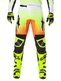 Alpinestars 2025 Fluid Wurx Pants, calças de motocross, amarelo néon e laranja, logótipos de estrela pretos e brancos, design de corrida elegante com secções pretas nos joelhos, coordenadas com botas e luvas amarelo néon a condizer