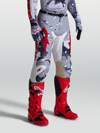 Alpinestars Racer Air Lone, calças de motocross para homem, padrão camuflado cinzento e vermelho, design perfurado off-road.