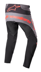 Alpinestars 2023 Techstar Sein Pants, calças de motocross, pretas e vermelho néon, vista traseira com painel de assento cinzento e logótipo grande em vermelho néon, pernas ergonómicas pré-curvadas e construção têxtil durável para desempenho todo-o-terreno