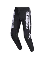 Alpinestars 2026 Fluid Apex Pants, calças de motocross, pretas e cinzentas, com logótipo astars vertical branco nas pernas, design ergonómico sport-fit pré-curvado, construção durável em polifabric 600D para condução todo-o-terreno
