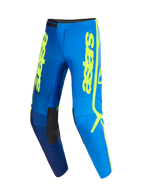 Alpinestars 2026 Fluid Apex Pants, calças de motocross, azul e amarelo fluo, com logótipo 'astars' vertical em amarelo, painéis internos nos joelhos em preto e design ergonómico pré-curvado para desempenho em todo-o-terreno