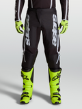 Alpinestars calças Fluid Apex V2 2027, calças de motocross para homem pretas e prateadas, com painéis elásticos ergonómicos.