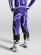 Alpinestars Calças Fluid Apex V2, calças de motocross para homem, azul escuro e branco, padrão ergonómico 3D e logótipo de estrela traseiro, ideais para off-road.