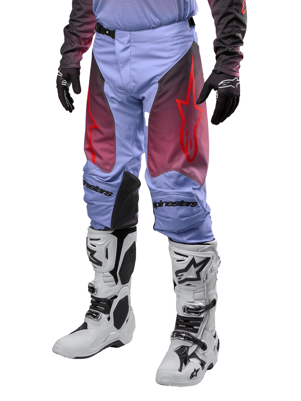 Alpinestars 2024 Racer Hoen Pants, Motocross Pants, Lavan Purple and Black with red graphics, featuring red star logos on the thighs and black lettering on the knees, worn with white and black boots and black gloves