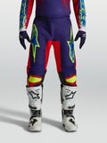 Calças Fluid Drag Alpinestars, calças de motocross para homem, azul marinho e vermelho, com ajuste desportivo e construção resistente para todo-o-terreno.