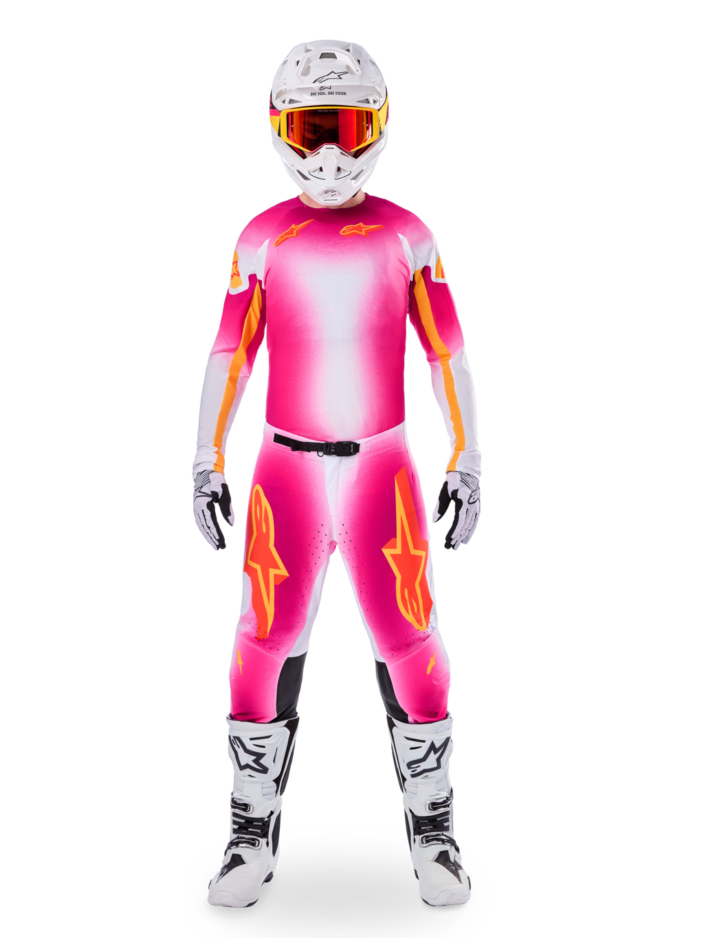 Motocross rider wearing Alpinestars Limited Edition Supertech AFD MIG Gear Set, vibrant Pink Fluo and White gradient jersey and pants with orange logos, white helmet with red goggles, white and black boots and gloves, coordinated professional racing outfit.