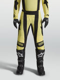 Calças Techstar Atrox da Alpinestars, calças de motocross amarelas e pretas com perfurações a laser e ajuste atlético