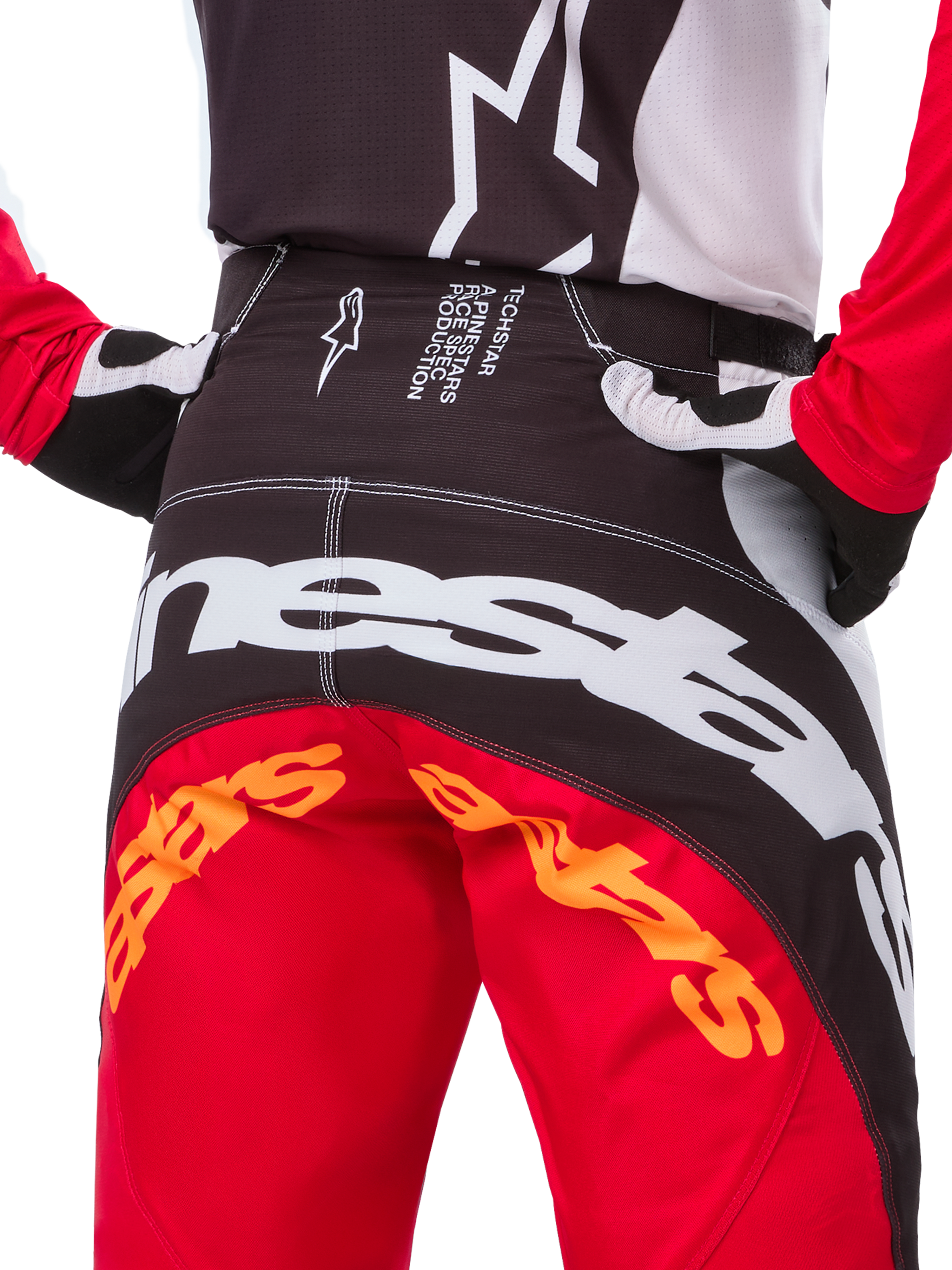 Alpinestars Limited Edition Techstar Deep Pants, Motocross Pants, Black White and High Red, featuring a multi-panel design, reinforced knees, and 4-way stretch panels for off-road performance.