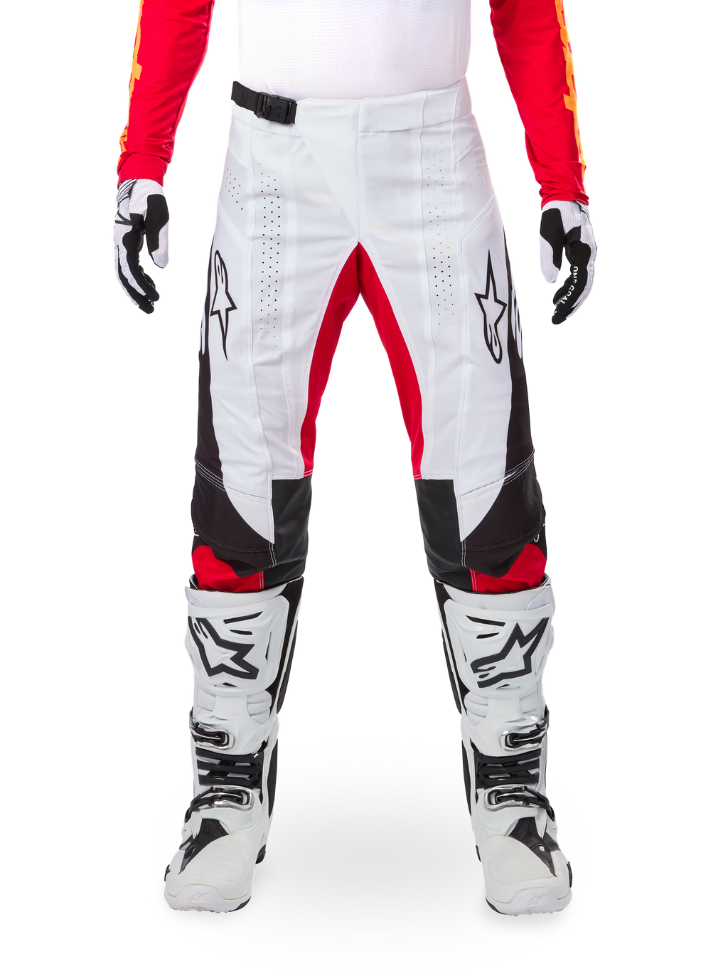 Alpinestars Limited Edition Techstar Deep Pants, Motocross Pants, White with Black and Red accents, featuring star logo and laser perforations, worn with white motocross boots and gloves, durable technical material for off-road riding