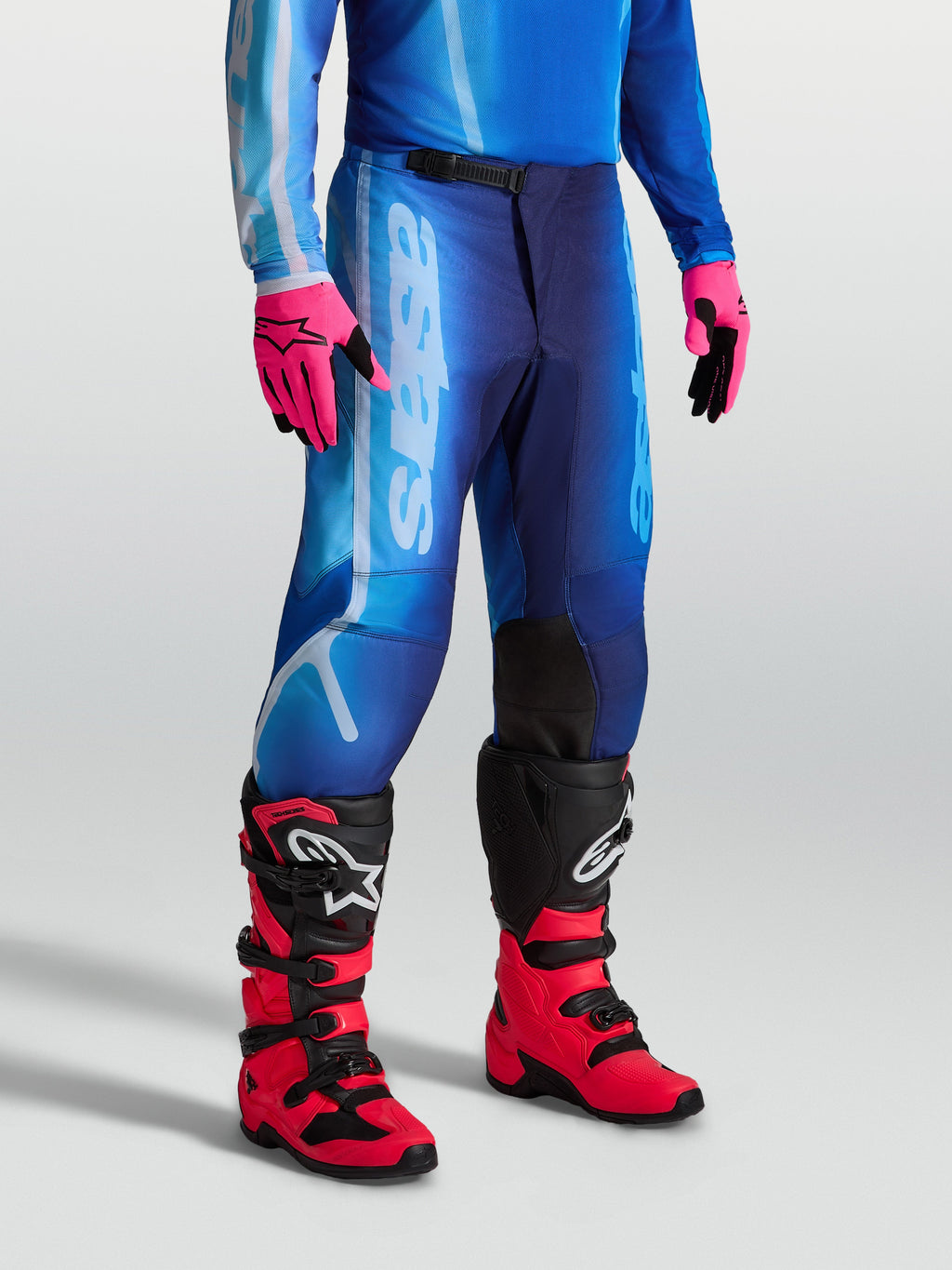 Alpinestars Fluid Kepler, calças de motocross para homem azuis, com pernas pré-curvadas e construção em polifabric 600D.