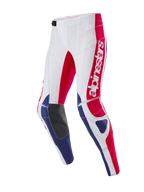 Alpinestars Limited Edition Techstar Fortitude Pants, Motocross Pants, Bright Red White and Blue, featuring large red Alpinestars branding on the thigh, black leather inner knee panels, and perforated ventilation zones, athletic race fit for off-road racing