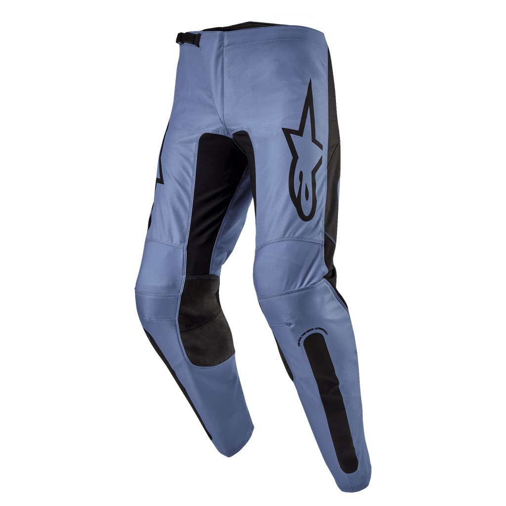 Alpinestars 2024 Fluid Lurv Pants, Motocross Pants, Light Blue and Black, featuring a large black Alpinestars logo on the thigh, black reinforced inner knee panels, and ergonomic pre-curved leg design for off-road riding.