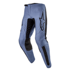 Alpinestars 2024 Fluid Lurv Pants, Motocross Pants, Light Blue and Black, featuring a large black Alpinestars logo on the thigh, black reinforced inner knee panels, and ergonomic pre-curved leg design for off-road riding.