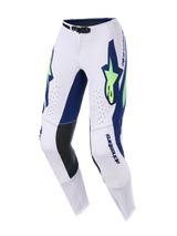 Alpinestars 2026 Supertech Vista Pants, Motocross Pants, Light Gray Yellow Fluo Blue, featuring bold blue graphics with neon yellow star logos, black leather inner knee panels, laser-cut ventilation holes, and a streamlined athletic fit for off-road performance.