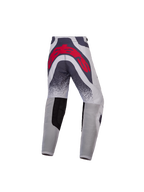 Alpinestars Calças Supertech Swan Juventude, calças de motocross cinzentas e vermelhas, vista traseira com logótipo e painéis ventilados.
