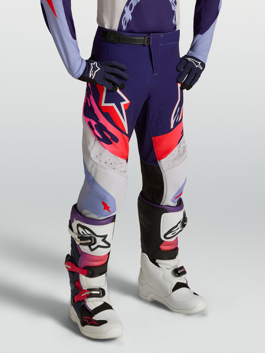 Alpinestars Calças Supertech Dyna Juventude 2027, calças de motocross roxas e rosa fluo com rip-stop de alta durabilidade.