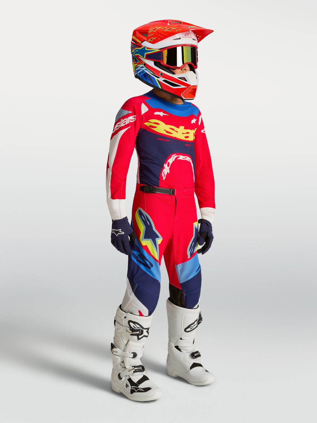 Alpinestars Supertech Dyna Juventude, calças de motocross para jovens, vermelhas e azul-marinho, modelo com camisola, capacete e botas