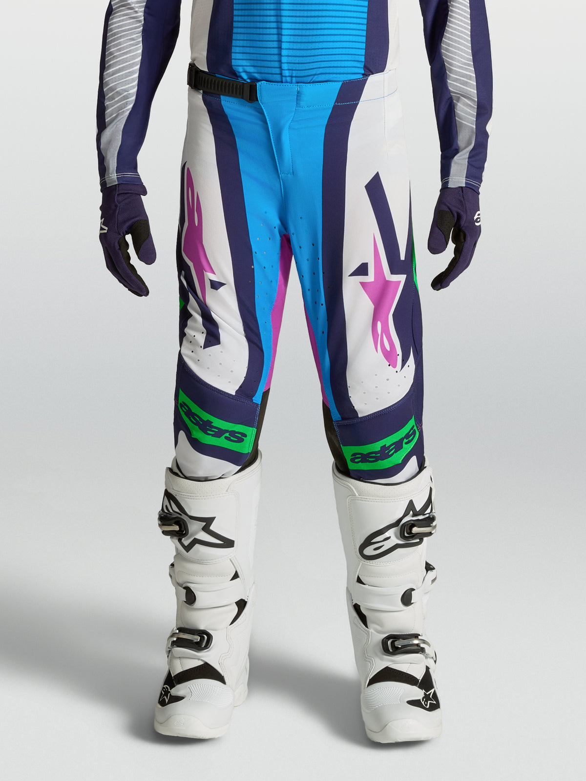 Alpinestars Youth Supertech Maven Pants, white and blue motocross gear with fluo green accents and athletic performance fit.