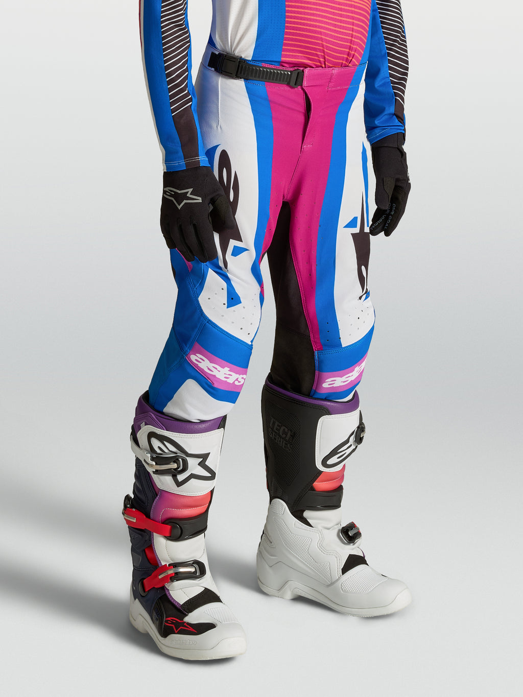 Alpinestars Calças Supertech Maven Juventude, calças de motocross azul e coral, ajuste atlético para jovens pilotos.