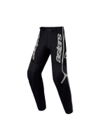 Alpinestars Calças Fluid Apex V2 Jovem, calças de motocross pretas e prateadas, construção ergonómica em têxtil.