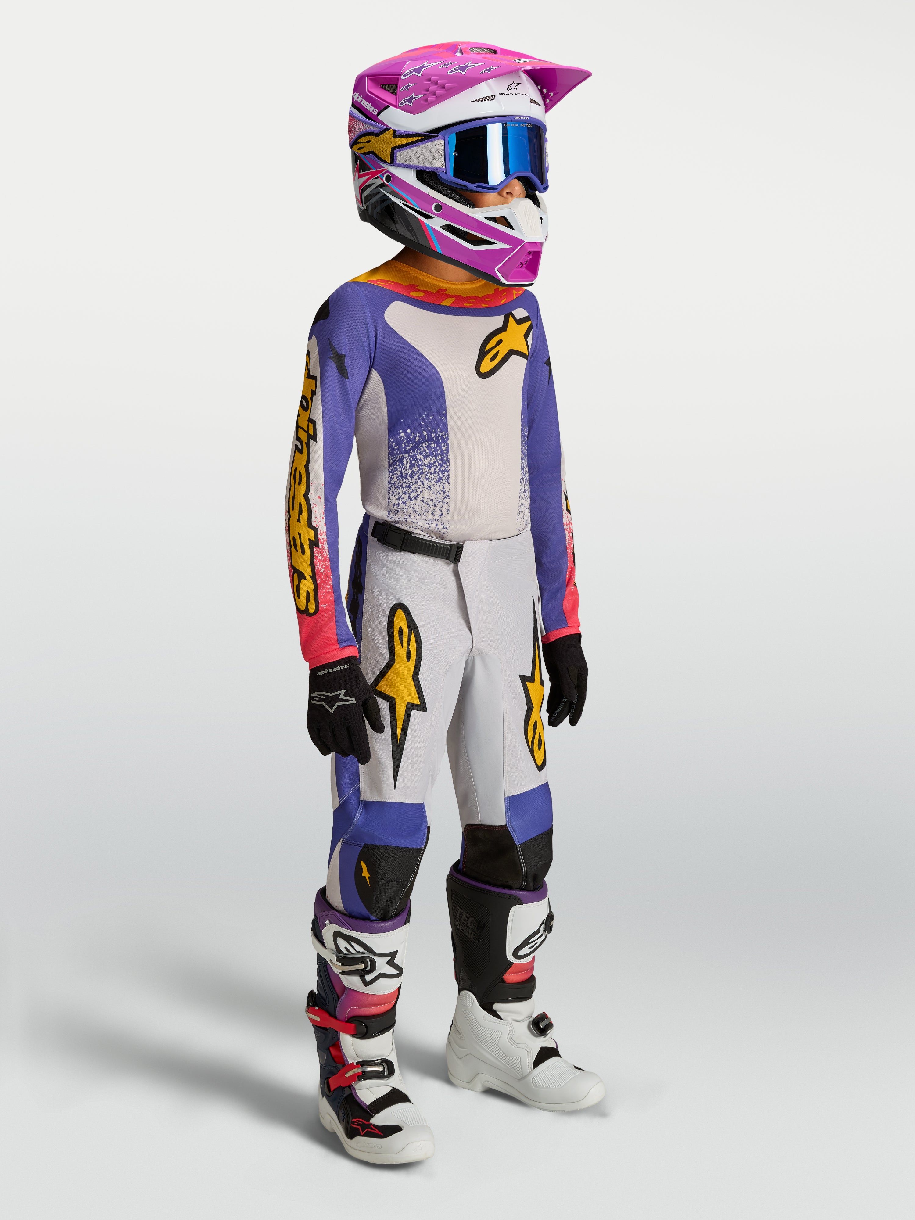 Calças Alpinestars Fluid Drag Juventude 2027, para motocross, azul e branco, tecido resistente e ajuste ergonómico.