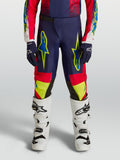 Alpinestars Fluid Drag Juventude 2027, calças de motocross, azul-marinho, vermelho e amarelo néon, grafismos vibrantes