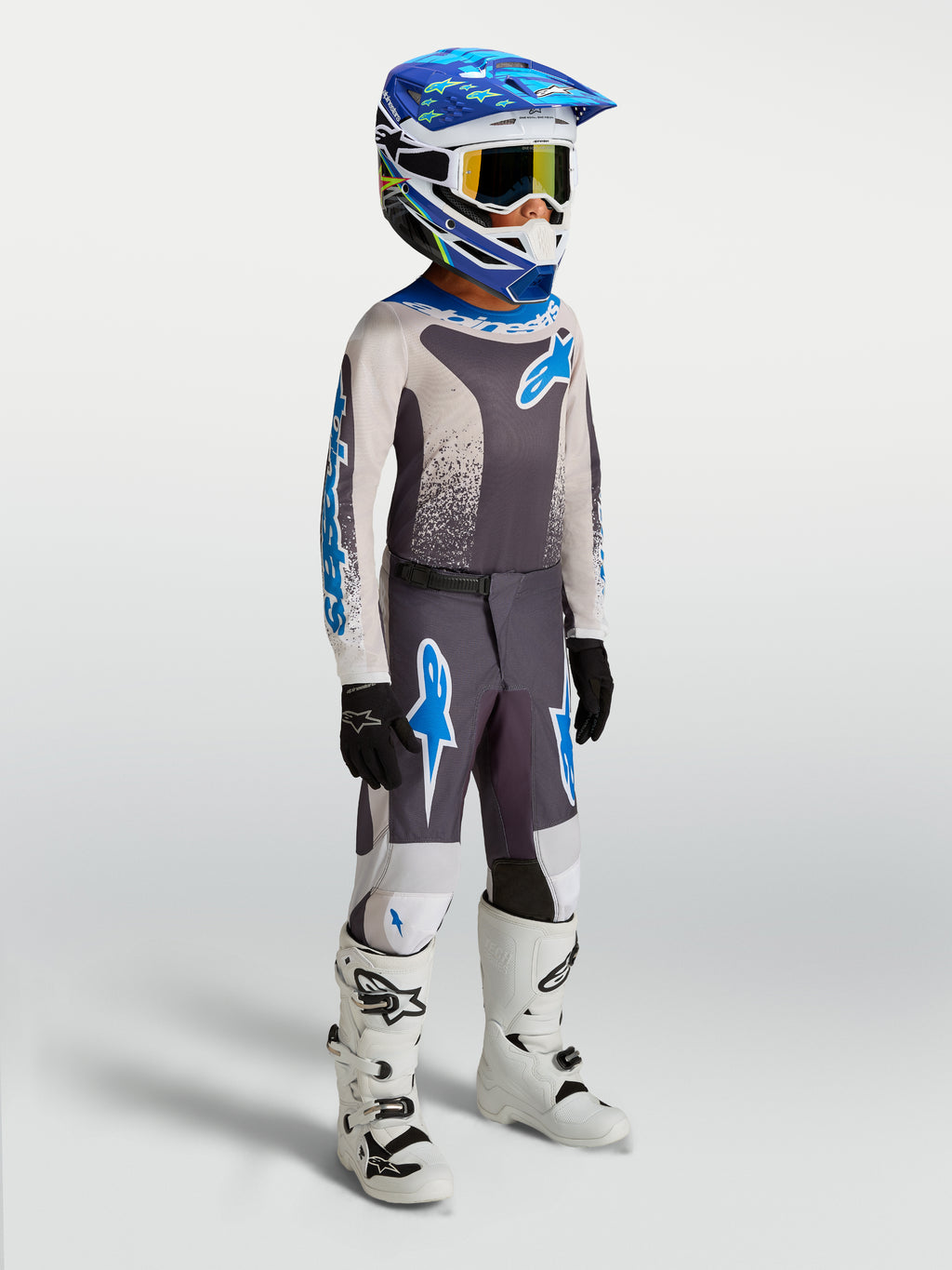 Alpinestars calças Fluid Drag Juventude 2027, calças de motocross cinzentas e azuis, polifabric 600D resistente.