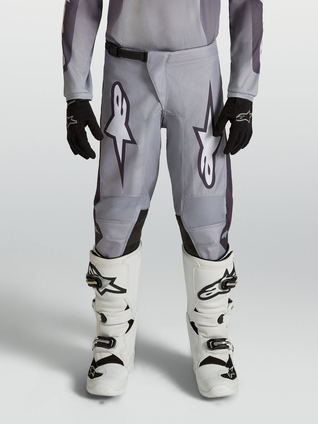 Alpinestars Fluid Amber, calças de motocross para juventude, cinzentas e pretas, ideais para todo-o-terreno.