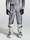 Alpinestars Fluid Amber, calças de motocross para juventude, cinzentas e pretas, ideais para todo-o-terreno.