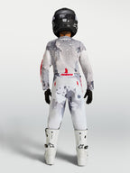 Alpinestars Calças Fluid Lone Juventude, calças de motocross para jovens em branco e camuflagem cinzenta, vista traseira.