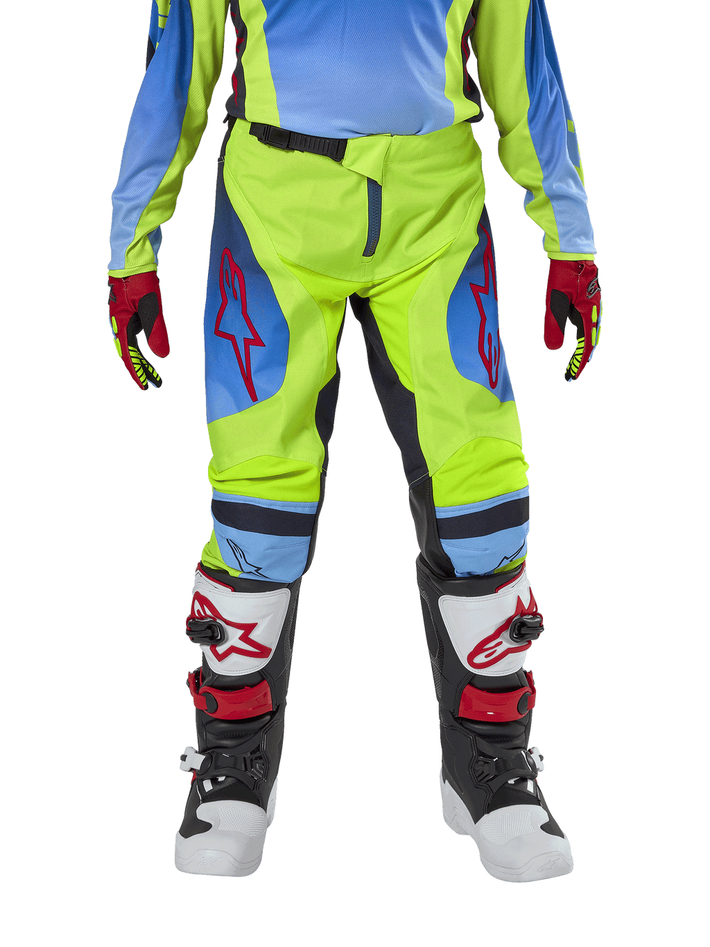 Alpinestars Youth 2024 Racer Hoen Pants, calças de motocross, amarelo néon e azul Night Navy, com logótipos de estrela vermelhos nas coxas, usadas com camisola a condizer, luvas vermelhas e pretas, e botas de motocross brancas, pretas e vermelhas, equipamento resistente para todo-o-terreno