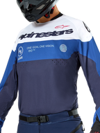 Camisola Alpinestars Pro-Dura, camisola de enduro e motocross, azul-marinho, azul brilhante e branco, corte atlético com branding em destaque, construção têxtil durável para desempenho em todo-o-terreno