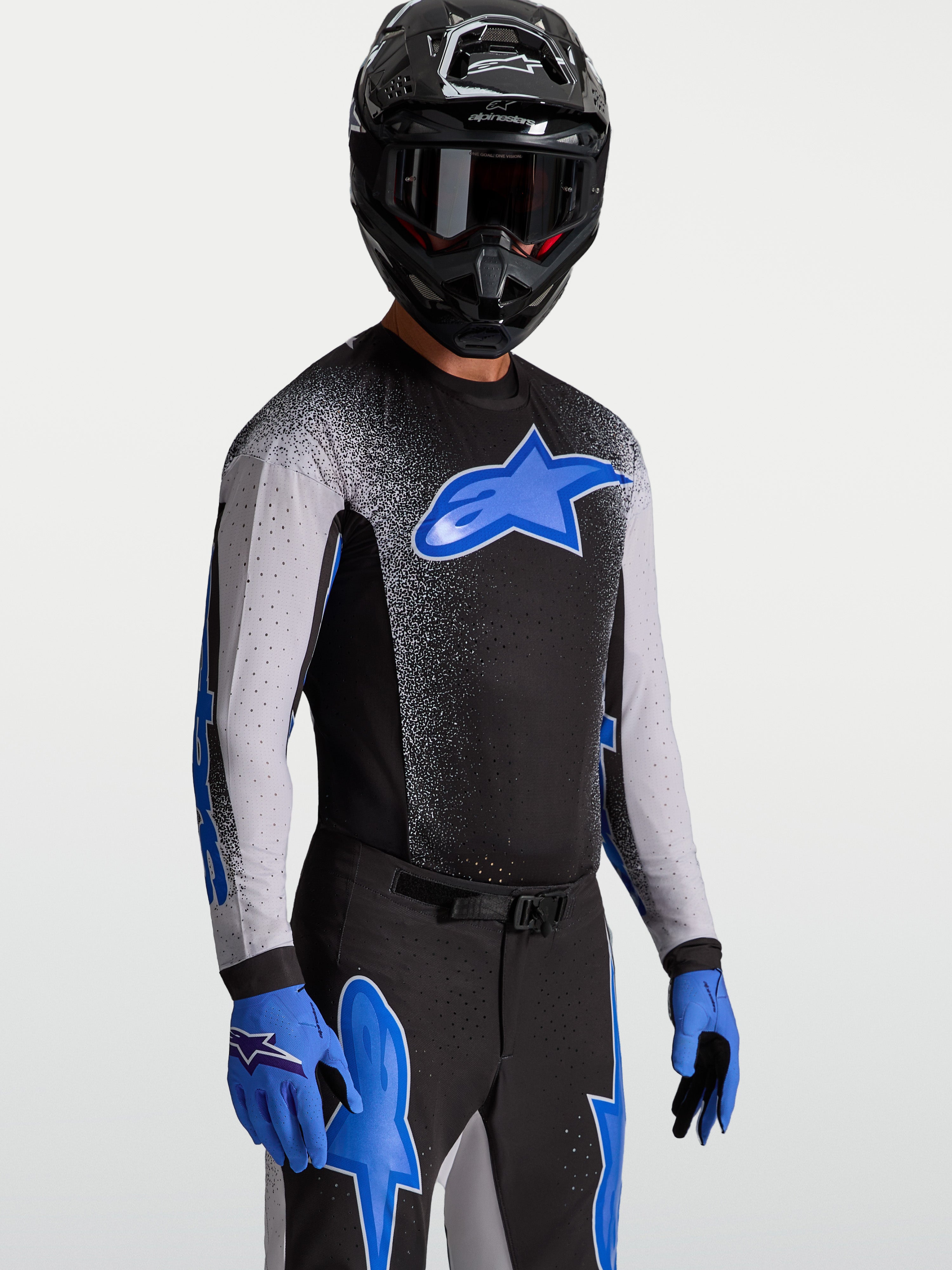 Alpinestars Supertech Hiten AFD, camisola de motocross para homem, preta e azul, em malha elástica respirável.