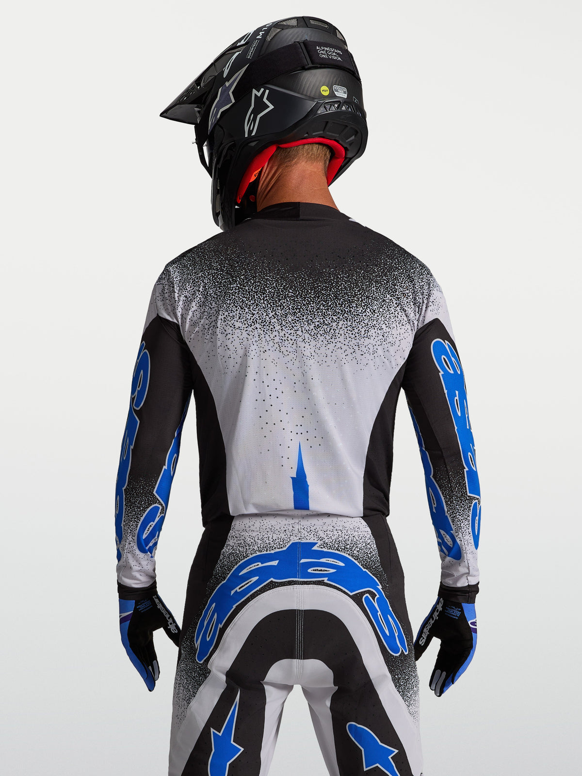 Alpinestars Supertech Hiten AFD Jersey, Motocross Racing, Men, Black and Blithe Blue, rear view showing athletic fit.
