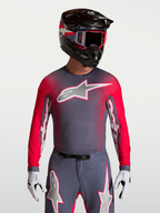 Camisola Alpinestars Supertech Hiten AFD, para motocross, cinzenta e vermelha fluo, malha ventilada premium para homem.