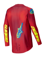 Alpinestars Camisola Supertech Maker 2025, camisola de motocross para homem, vermelha e amarelo fluo, vista traseira mostrando a construção em malha elástica e os detalhes gráficos